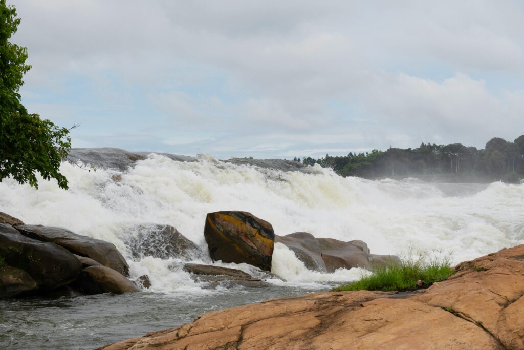 Enchanting Uganda Vibrant shot of powerful rapids in the Nile River, Uganda, capturing natural beauty.